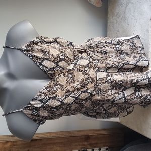 Maurices. Size large. Tan white black.